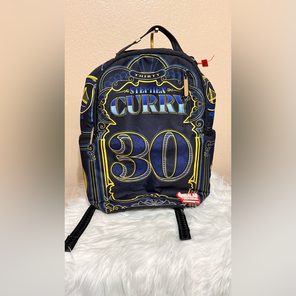 Sprayground Black and Yellow Graphic Backpack